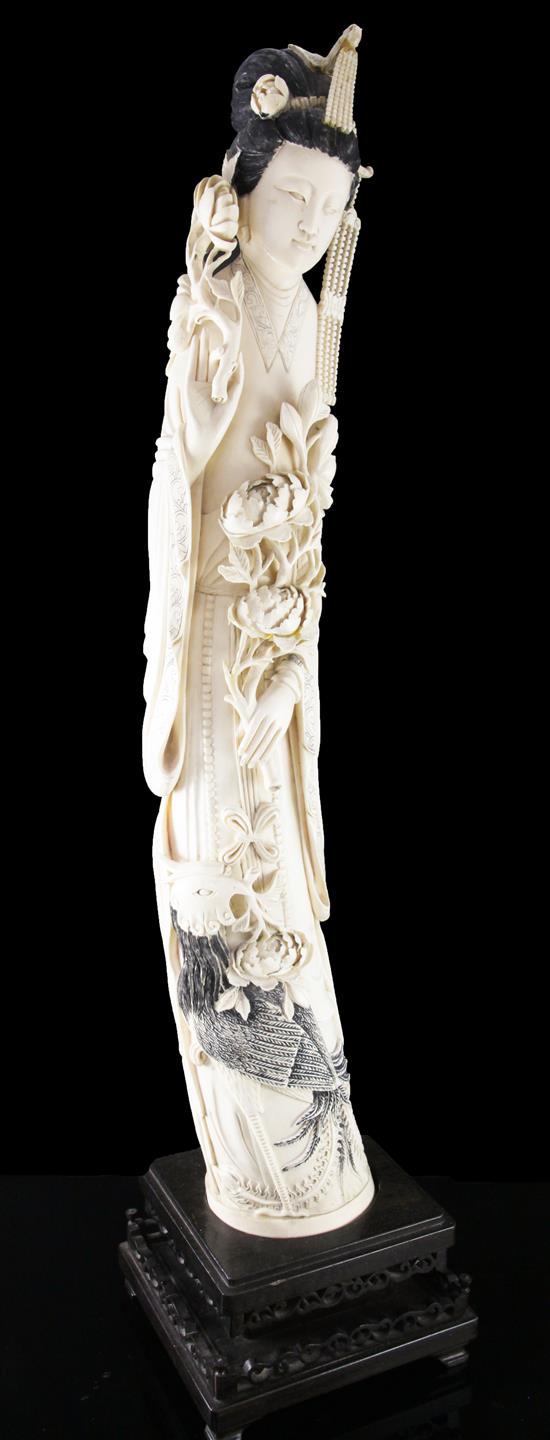 A large Chinese ivory tusk figure of an empress, first half 20th century, total height 85.5cm, small repairs